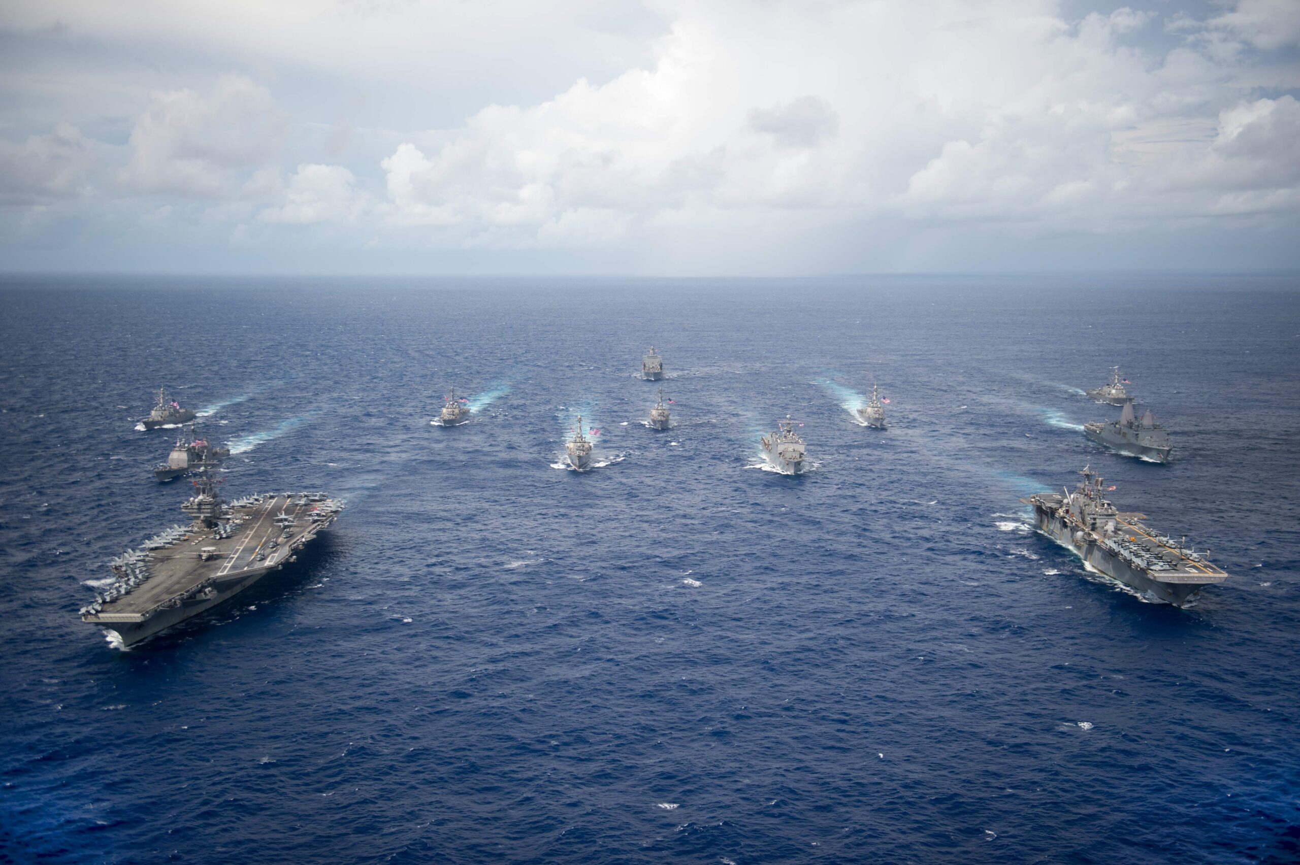 PHILIPPINE SEA (Sept. 23, 2016) USS Ronald Reagan (CVN 76) and USS Bonhomme Richard (LHD 6) lead a formation of Carrier Strike Group Five and Expeditionary Strike Group Seven ships including, USS Momsen (DDG 92), USS Chancellorsville (CG 62), USS Stethem (DDG 63), USS Benfold (DDG 65), USS Curtis Wilbur (DDG 54), USS Germantown (LSD 42), USS Barry (DDG 52), USS Green Bay (LPD 20), USS McCampbell (DDG 85), as wells as USNS Walter S. Diehl (T-AO 193) during a photo exercise to signify the completion of Valiant Shield 2016. Valiant Shield is a biennial, U.S. only, field-training exercise with a focus on integration of joint training among U.S. forces. This is the sixth exercise in the Valiant Shield series that began in 2006.  (U.S. Navy photo by Mass Communication Specialist 2nd Class Christian Senyk/Released)160923-N-NT265-419 
Join the conversation:
http://www.navy.mil/viewGallery.asp
http://www.facebook.com/USNavy
http://www.twitter.com/USNavy
http://navylive.dodlive.mil
http://pinterest.com
https://plus.google.com